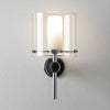 Hotel wall sconce wiith glass shade