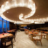 Curved flush mounted crystal chandelier